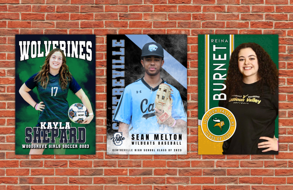 Three senior banners on brick wall